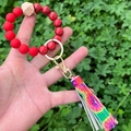 Detailed close-up of beaded wristlet keychain with colorful tie-dye tassel and beads - Tie-Dye Tassel Red Marble Beaded (款27)