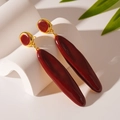 Detail of red enamel long earrings with gold metallic edges on white display stand - Red Water Drop Earrings (S925 Pin)