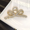 Elegant gold bow-shaped hair claw clip adorned with sparkling rhinestones for women - Hollow Bowknot Gold Full Diamond Claw