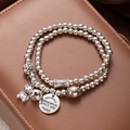 Double-layer silver bead bracelet with lucky cat and teddy bear charms on leather - Bear