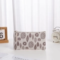 Large beige linen toiletry bag with brown leaf print and secure zipper closure - Leaf (No Label) / Large