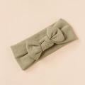 Detailed view of an olive green textured knit baby headband with a soft bow decoration - Olive Green