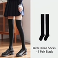 Classic black over-the-knee socks for women made of elastic cotton blend fabric - One Size / Solid Over Knee Socks - Black