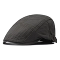 Detail of dark grey retro newsboy hat featuring decorative diamond stitching and metal buckle - Army Green