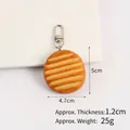 Realistic PVC lattice cookie keychain with yellow texture and silver metal carabiner hook - Wavy Chip Lobster Clasp