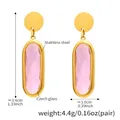 Detailed view of pink faceted Czech glass earrings with 18K gold stainless steel frames - Oval Dangle Style (TXF272) / Gold Pink