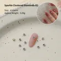 Nail art decoration with silver base and cluster of sparkling clear rhinestones - 4mm (10 Pcs)