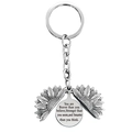 Detail of opening sunflower keychain with engraved inspirational quote inside - T00007 Full Silver (You are braver than you believe)