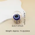Detail view of a 4cm evil eye hair claw clip made of clear acrylic showing size and weight - 4cm Round Eye Claw Clip