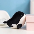 Adorable black and white orca plush toy with soft texture leaning on a pink gift box - Killer Whale / 17cm