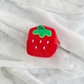 Close-up of a plush strawberry coin purse with green leaves and a silver bead chain - Square Strawberry