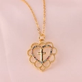 Golden heart necklace with colorful zircon stones and internal cross on pink fabric - Heart Cross Style