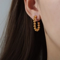 Vintage gold U-shaped beaded hoop earrings in 18k plated stainless steel on model - F1130-Gold