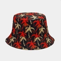 Close-up of reversible bucket hat with tropical palm tree patterns on thick cotton canvas - Color 3 / Black Palm Tree Print