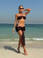 Detail view of black three-piece bikini with metallic ring buckle and draped skirt detail - S / Coffee