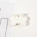 Detailed close-up of a matte white bow-shaped hair claw clip with a strong metal spring - 4cm Butterfly-Milk White