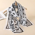 Fashionable black and white skull print chiffon long scarf hanging on wooden hanger - Black and White Skull