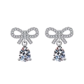 Silver bow earrings with pear-cut drop stones and micro-pave cubic zirconia accents - TED337-Bow Knot Teardrop Drop