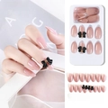 Unghie finte rosa traslucido con fiocchi 3D neri e borchie dorate, set da 24 pezzi - F785-24 Rosa Nude Fiocco Nero
