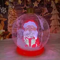 Inflatable Christmas ball with LED lights featuring Santa Claus and gift box design - Transparent Santa with Base and Light
