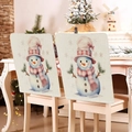 Vista detallada de dos fundas de silla navideñas con diseño de muñeco de nieve en comedor - Estilo Muñeco de Nieve con Gorro Rosa (YT55-2)