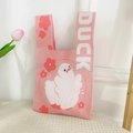 Close-up of pink knitted tote bag featuring a white cartoon duck and floral pattern - Pink Dancing Duck Bag