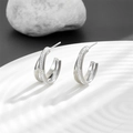 Silver interlocking double hoop earrings with cubic zirconia and polished steel finish - Double Loop Cross Style / Silver
