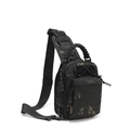 Detailed view of the laser-cut MOLLE system and paracord handle on the camouflage chest bag - Black Multicam