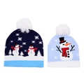 Dettaglio di cappelli di Natale in maglia con motivi pupazzo di neve e pompon bianchi - Adulto / Pupazzo di Neve