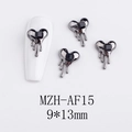 Macro detail of lava-style heart nail charm with black square rhinestone and 9x13mm scale - Liquid Drip Black Heart (AF15)