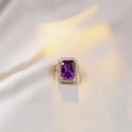 Elegant gold ring featuring a rectangle cut purple gemstone with double diamond halo - Purple Ring (Gold)