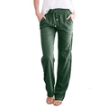 Détail de la taille élastique à cordon et des poches sur ce pantalon en lin vert foncé - S / Vert olive