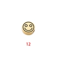 Detail of golden stainless steel cylinder bead featuring a laser-engraved smiley face design - Expression 12