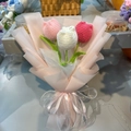 Handmade crochet tulip bouquet with pink, white, and red flowers in elegant gift wrap - Fat Tulip Pink Series