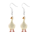 Close-up of cute white goose acrylic earrings with silver metal hooks on white background - Goose