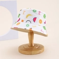 Detail of white cotton sun hat featuring vibrant fruit patterns and Sweet Fruit text - Kids One Size / White (Fresh/Sweet Print)