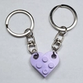 Pair of purple heart block keychains for couples made of durable plastic and metal - Purple