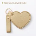 Rose gold heart-shaped leather keychain mirror with strap and textured lychee finish - Strap Style / Champagne Gold