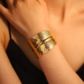Adjustable golden leaf texture wide cuff bangle featuring a detailed feather design - Feather Leaf