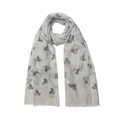 Detailed view of light gray scarf with metallic bee prints and frayed tassel edges - Gray