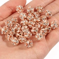 Makro-Detail von Roségold-Kristall-Discokugel-Abstandsperlen für DIY-Schmuckherstellung - 6mm (50 Stück Packung) / Yangmei-Ball Roségold Weißer Strass