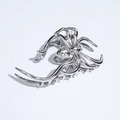 Elegant large silver spider-shaped metal hair claw clip with a glossy polished finish - Spider Silver
