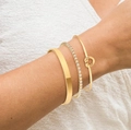 Dreiteiliges vergoldetes Armband-Set mit breitem Reif, Kristallkette und Knotendesign - Goldenes Set mit glattem Manschettenarmreif und Tennisarmband