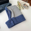 Blue and gray knitted balaclava hoodie with button detail on flat lay display - Gray Blue