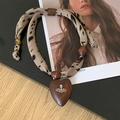 Vintage necklace with leopard print fabric cord, wooden beads, and heart saturn pendant - Necklace-Brown Saturn