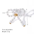 Elegant white pearl bow ring with gold bead detail and adjustable band size - Adjustable / Artificial Pearl Bow Woven Ring (JDRW2402003) / Gold