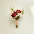 Macro shot of a dried flower boutonniere with red roses, white carnations, and twine wrap - Forest Flower 11 (Red White Carnation)