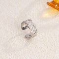 Adjustable silver woven texture ring in stainless steel with a minimalist open design - Intertwined Hollow / Steel