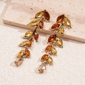 Detail of vintage wheat leaf drop earrings with amber and champagne crystals on stone base - 925 Silver Needle / Earrings / Gold