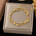 Three-layer golden snake chain bracelet with oval metal beads and polished finish - E70 Oval Bead Snake Gold Bracelet
